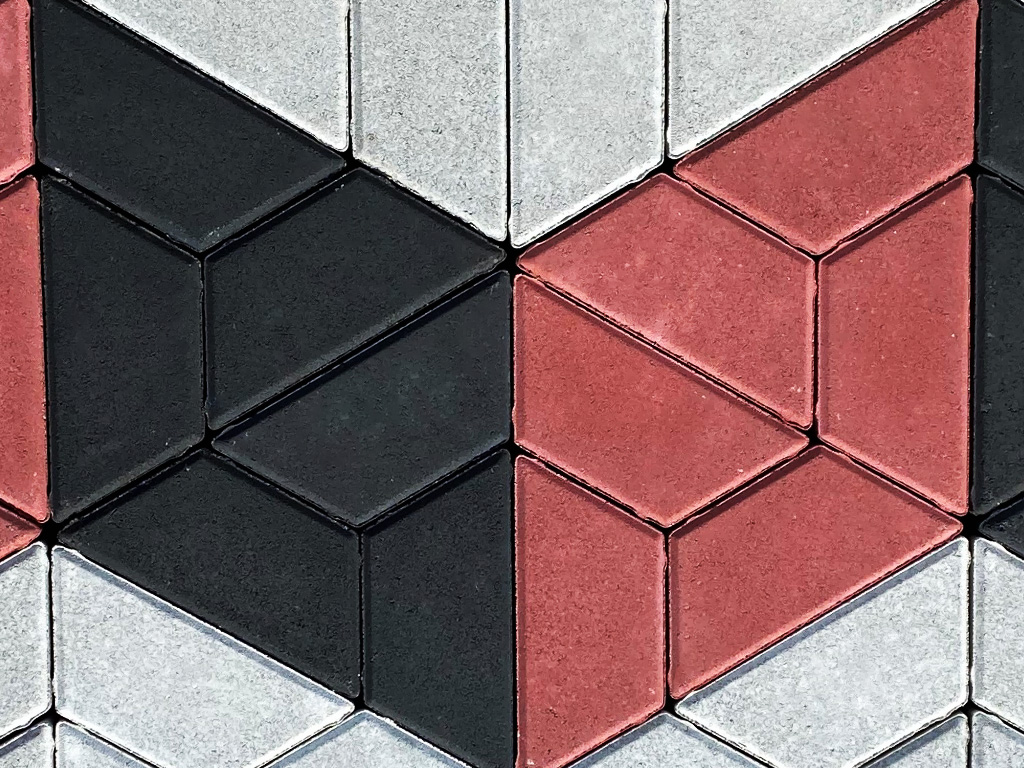 Red and white interlocking pavers for outdoor spaces